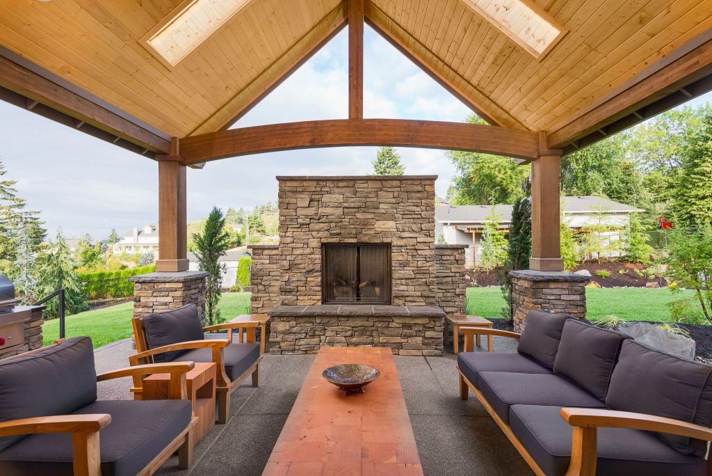 Enhancing Outdoor Living With Covered Fireplaces